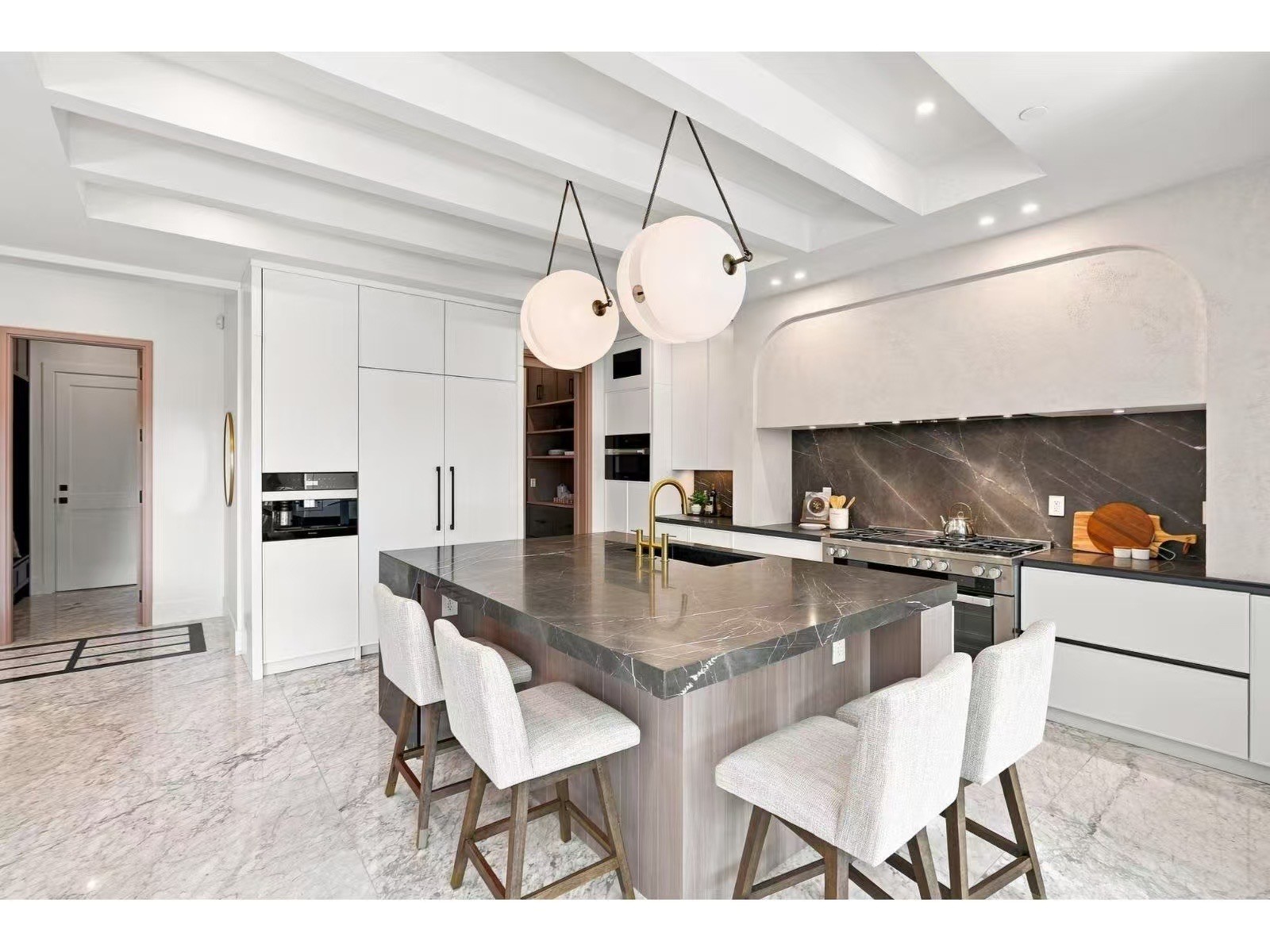 A completed kitchen and stone island from the family business